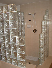 Decora pattern glass block tub and shower walls.